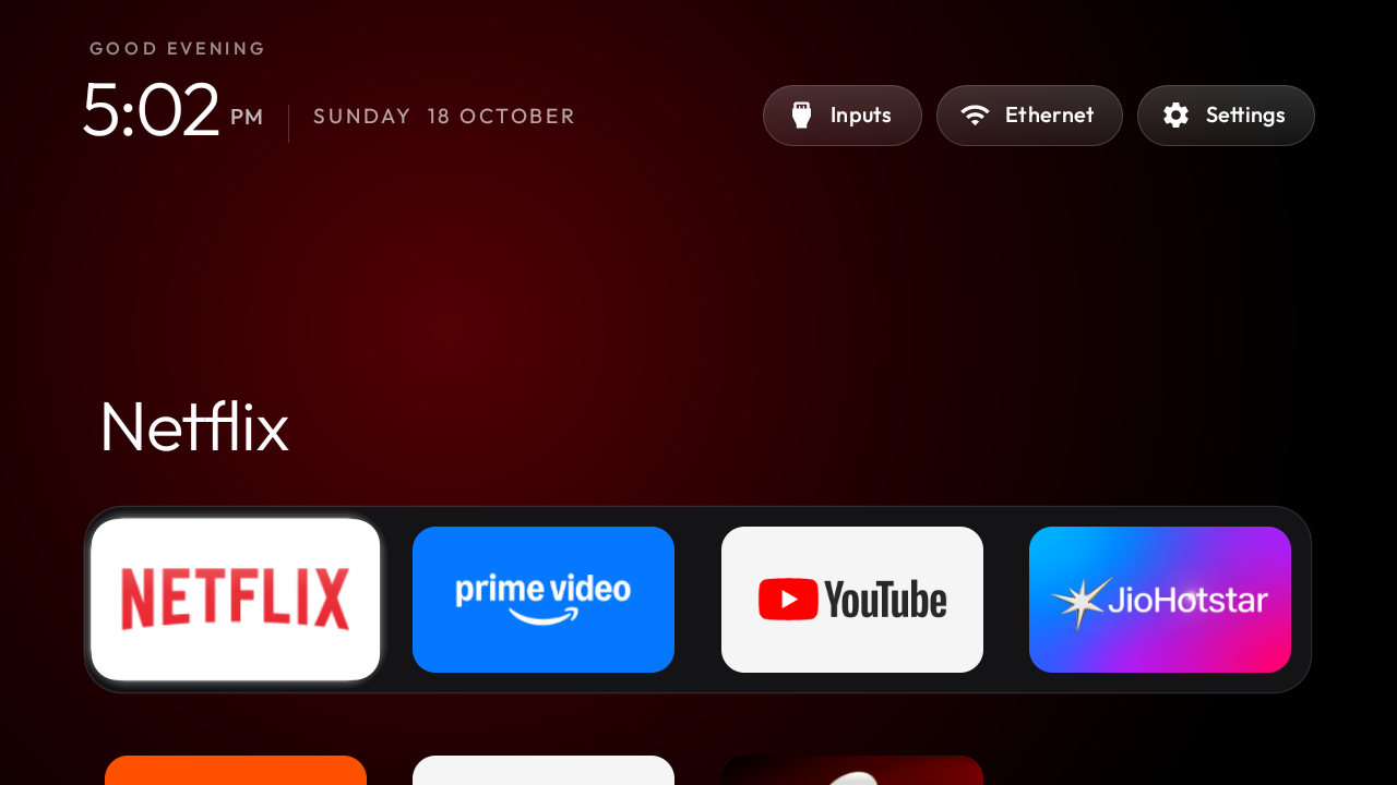 The top shelf names the focused app over an ambient glow in its colour